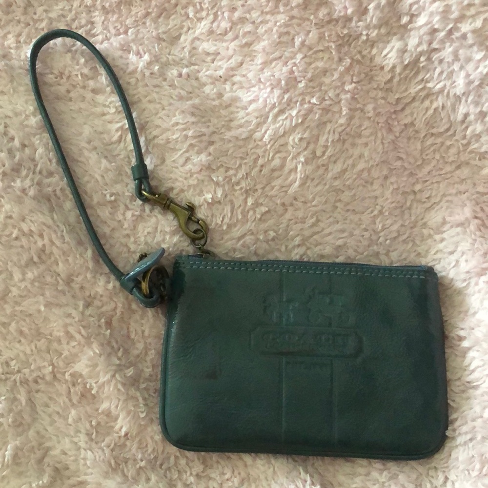 Patent leather Coach Bleeker wristlet new but has discolorations. See pics